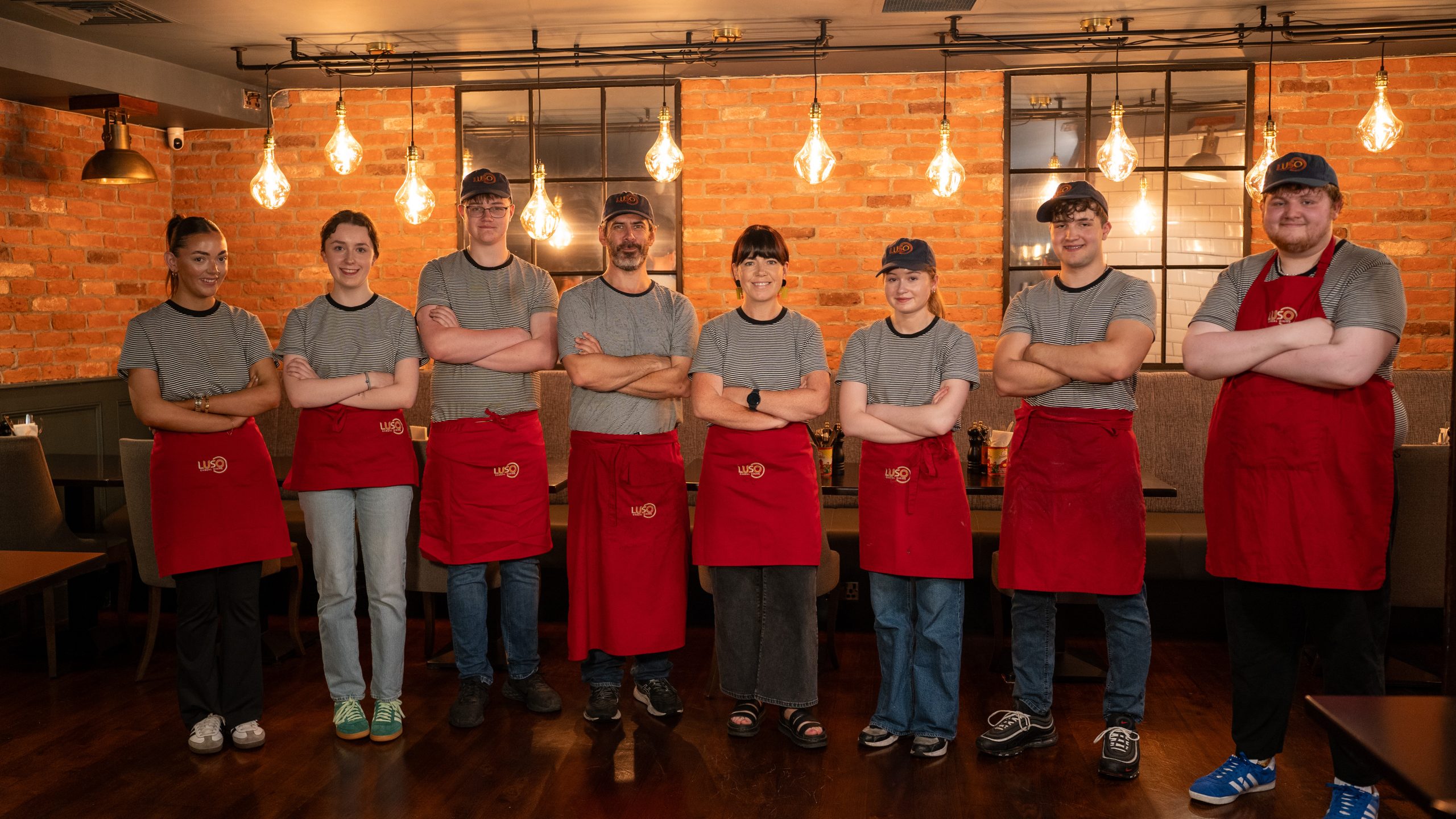The Luso crew lined up in the restaurant