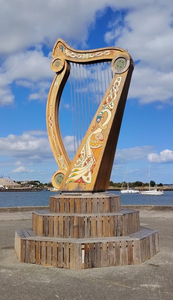 Wooden harp sculpture with Celtic designs, the fleadh's signature instrument