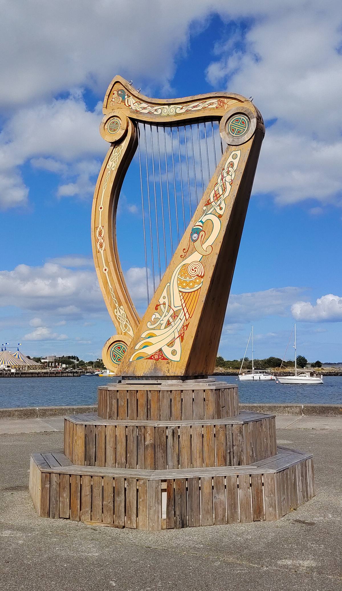 Wooden harp sculpture with Celtic designs, the fleadh's signature instrument