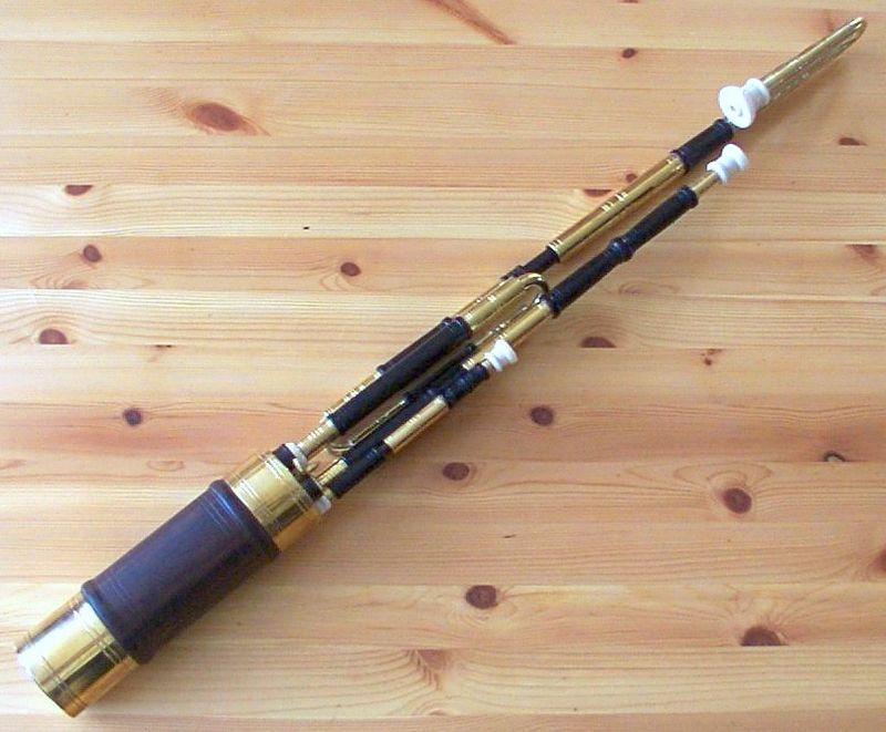 Uilleann pipes drones and regulators on a wooden floor