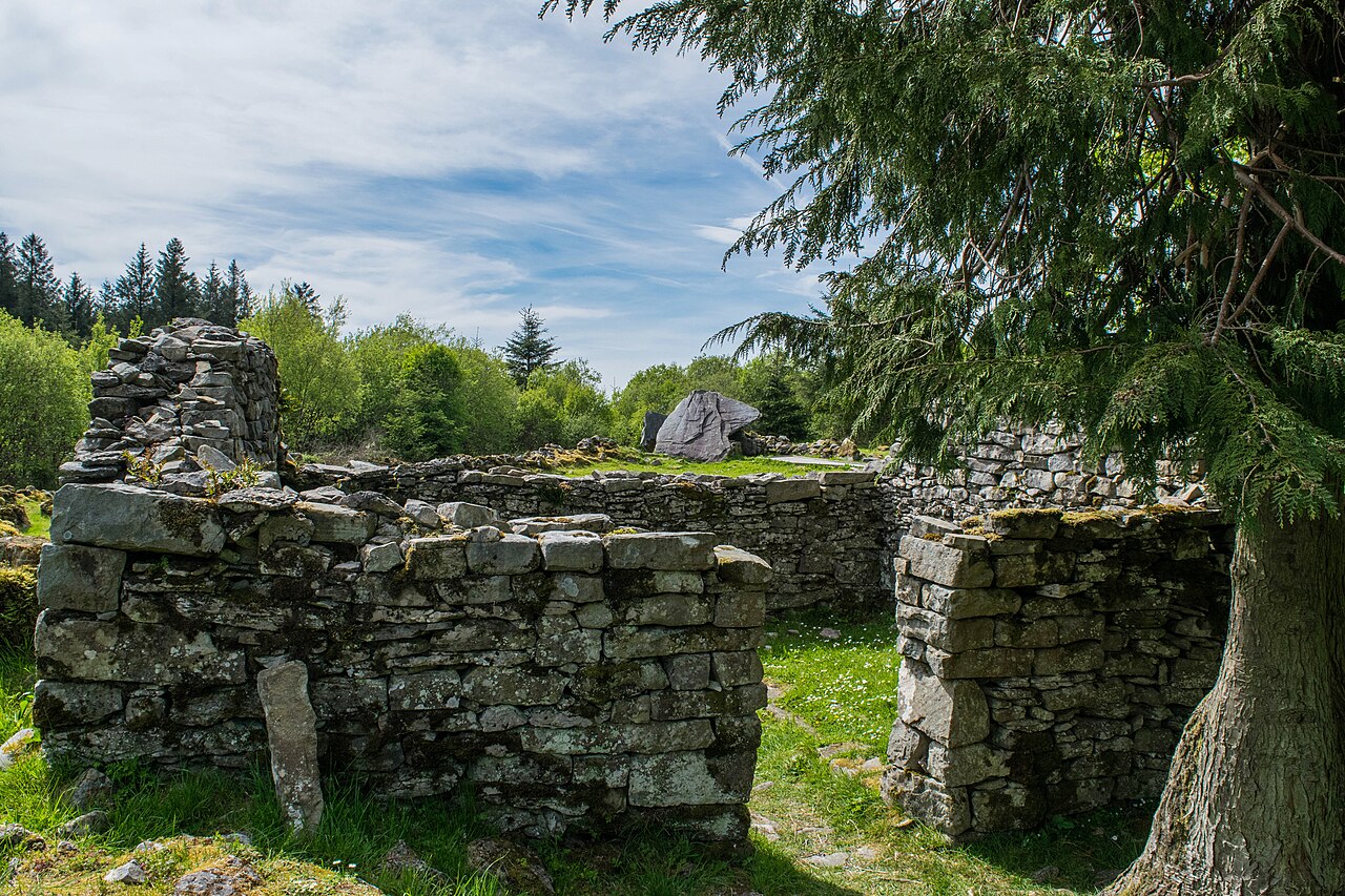 Old field walls and a glacial erratic boulder at Cavan Burren Park in County Cavan
